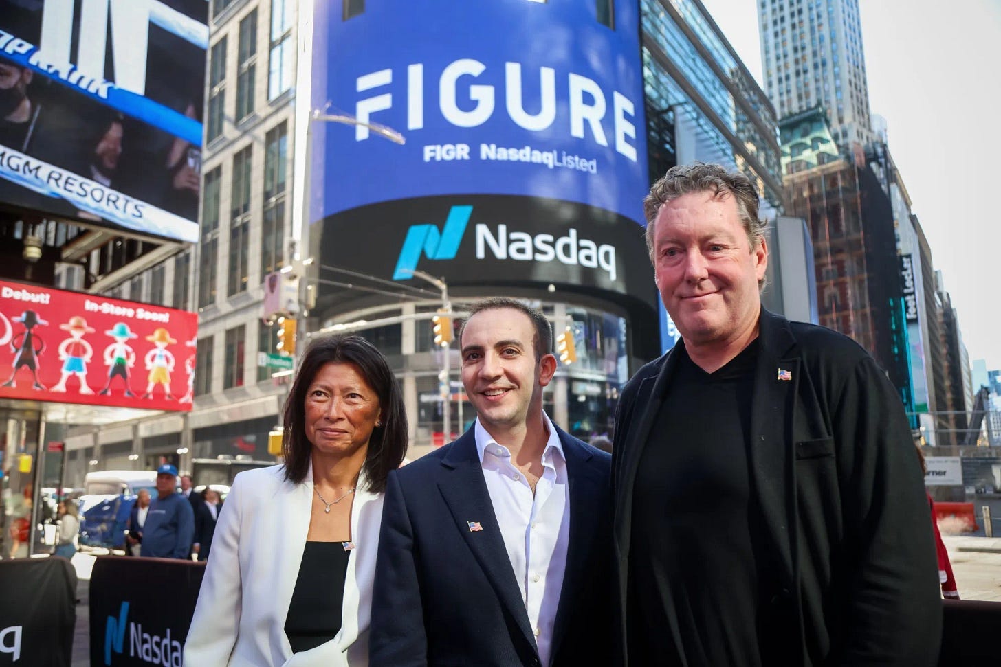 June Ou, left, Michael Tannenbaum, center, and Mike Cagney, during Figure Technology Solutions Inc.’s IPO in New York.